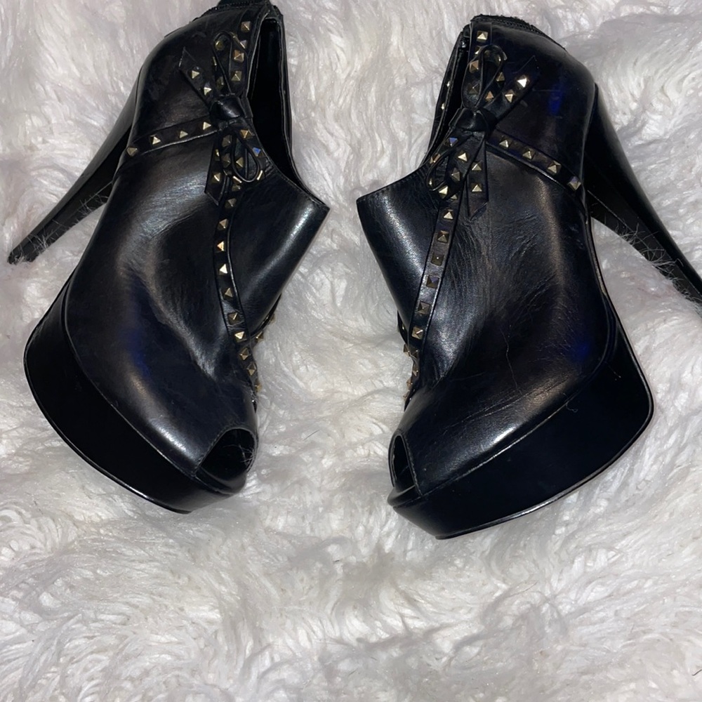 Black leather booties “TruthDare” by Madonna.